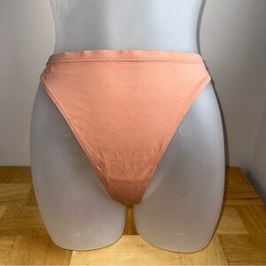 Womens vintage 90s dead stock high cut nude thong panties Sz 5/6 made in USA NWT